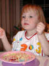 web_20030405-bday-45bethmessyface.JPG (42897 bytes)
